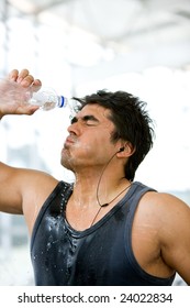 Strong Gym Man Splashing Water On His Face