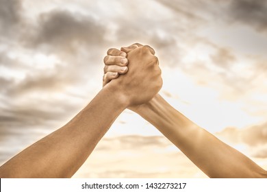 Strong Hands Coming Together Grasping One Another, Helping Hand. People Working Together, Unity, Teamwork 