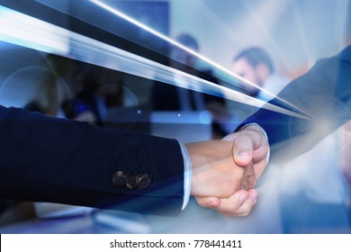 Strong Handshake Of Businessmen Confirming Successful Business Partnership