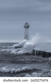 Strong High Wind Cold Crashing Waves, Sodus Point, Lake Ontario. Sodus Point Lighthouse Wayne County New York.