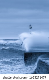 Strong High Wind Cold Crashing Waves, Sodus Point, Lake Ontario. Sodus Point Lighthouse Wayne County New York.