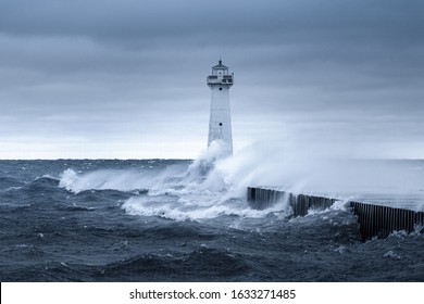 Strong High Wind Cold Crashing Waves, Sodus Point, Lake Ontario. Sodus Point Lighthouse Wayne County New York.