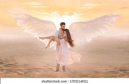 Strong male costume angel holds hug fragile innocent woman in arms. concept protection prayer security helper keeper love faith help religion. art sunset sky in desert. Girl and handsome man embracing