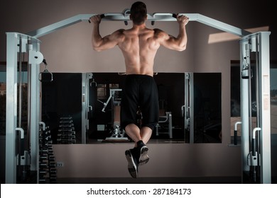 Strong Man Doing Pull Ups