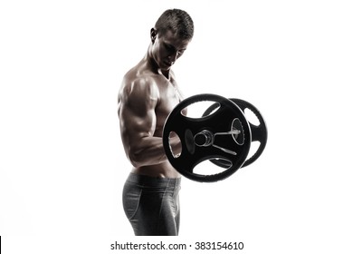 Strong Man Exercising Fitness Body Building Exercises With A Barbell