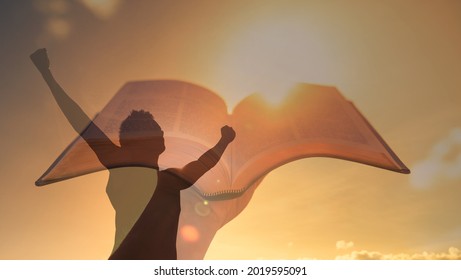 Strong man looking to god for spiritual hope and strength. Religious symbol bible. fight for god. - Shutterstock ID 2019595091