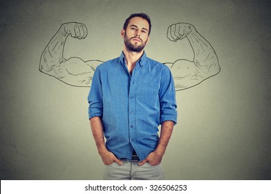 Strong Man, Self Confident Young Entrepreneur Standing Isolated On Gray Wall Background. Arrogant Bold Self-important Uppity Snobbish Stuck Up Man