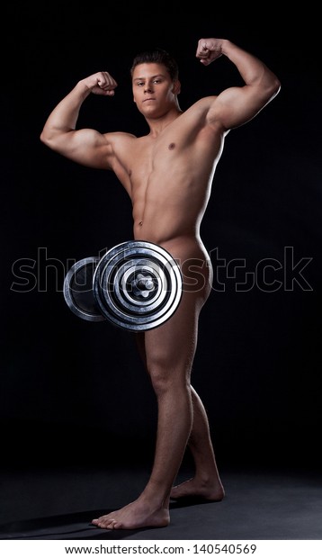 Strong Naked Man Posing Lifting Barbell Stock Photo 