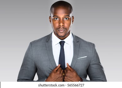 Strong powerful modern businessman pose looking confident successful accomplished driven intense - Shutterstock ID 565566727