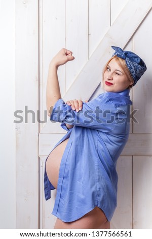 Strong pregnant woman pin up