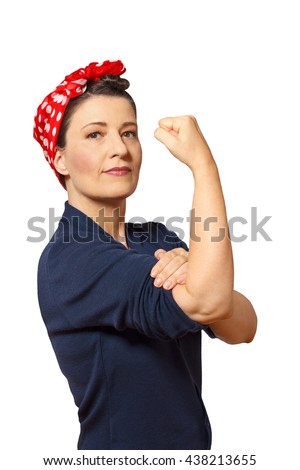 Strong and self-confident woman with a clenched fist rolling up her sleeve, icon of the american women's lib movement Rosie Riveter, isolated on white, copy space