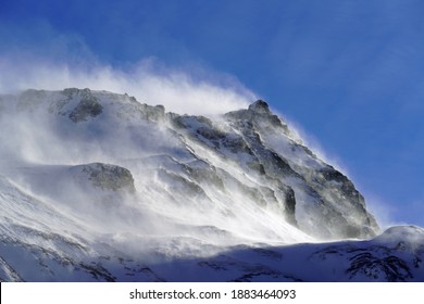 Strong South Wind In The Alps In Winter On A Sunny Day In The National Park Hohe Tauern In Austria