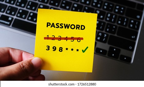 Strong And Weak Easy Password. Note Pad And Laptop.