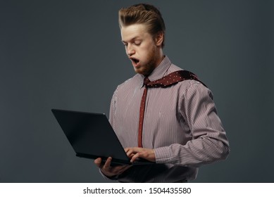 Strong Wind Blowing On Man With Laptop