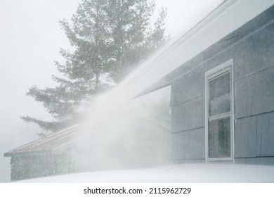 Strong Wind Blowing Snow Off The Roof In Blizzard        