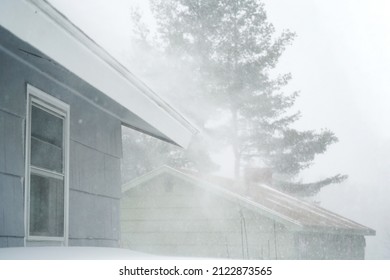 Strong Wind Blowing Snow Off The Roof In Blizzard        