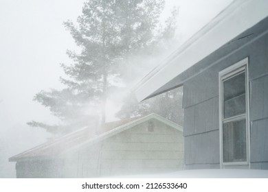 Strong Wind Blowing Snow Off The Roof In Blizzard       