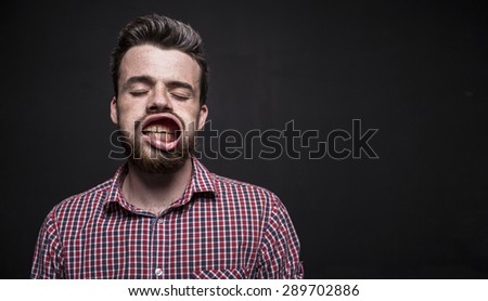 strong wind flow to the face. The guy makes faces