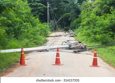 Strong Winds Bringing Down Power Lines To Blame. Transmission Lines Broken. Close Road