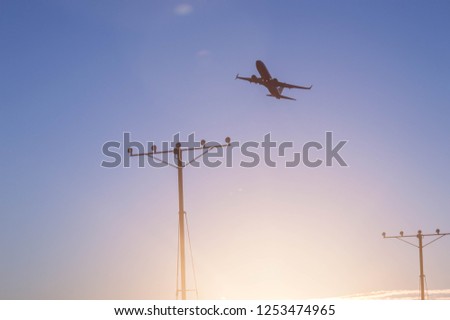 Similar – Flugzeug im Sonnenuntergang