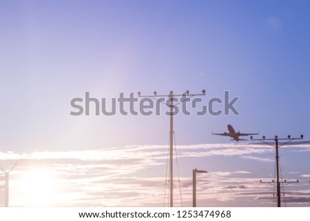 Similar – Flugzeug im Sonnenuntergang