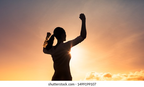 Strong woman flexing her arms. People feeling powerful, inner strength, victory, and hero concept.