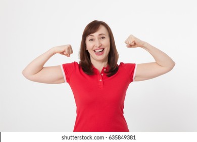 Strong Woman Showing Her Muscularity And Looking At Camera Isolated On White. Copy Space And Blank Shirt. Mother Day