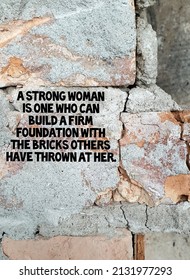 Strong Women Quote On Textured And Cracked Brick Background.