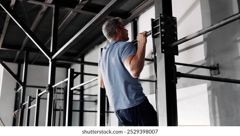 Strong Young Man Doing Pull Up Workout Training