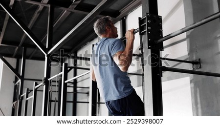 Strong Young Man Doing Pull Up Workout Training
