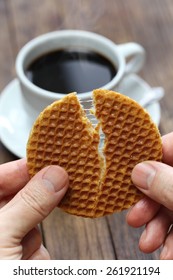 Stroopwafel Split By Hands, Dutch Snack And Coffee