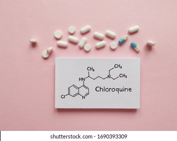 Structural Chemical Formula Of Chloroquine Molecule With Pills And Tablets. Chloroquine Is A Medication Used To Prevent And Treat Malaria, Also Being Tested As A Drug To Fight The Coronavirus Epidemic