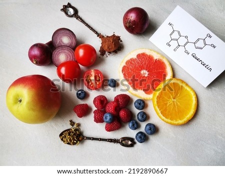 Structural chemical formula of quercetin molecule with fresh fruit and vegetable. Quercetin is a plant pigment (flavonoid). It's found in many plants and foods such as red onions, berries, tomatoes...