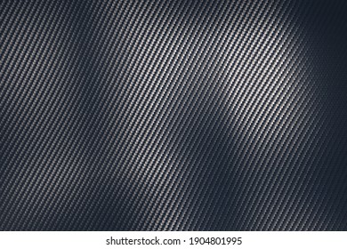 Structural Detail Of An Industrial Carbon Fibre Sheet In A Full Frame View Showing The Repeat Diagonal Pattern As Light Plays Across The Surface In A Background Texture