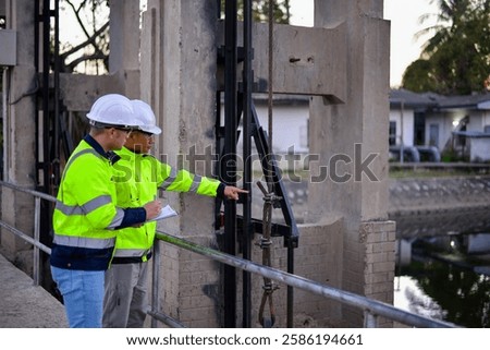 Structural engineers and technicians are rigorously inspecting the dam's floodgates to ensure they are functioning properly.