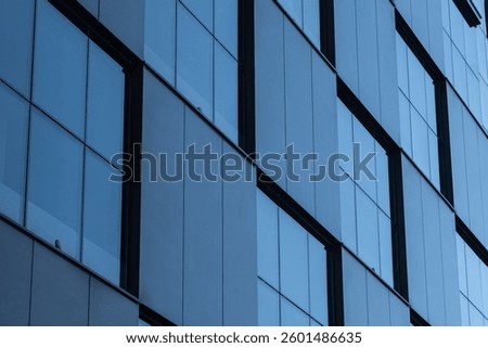 Structural glass wall with windows. Architecture details Glass wall Modern building exterior Abstract futuristic background. Exterior texture pattern. Modern facade