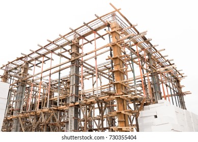 Structure Of Building Under Construction Isolated On White Background.