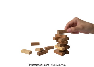 Structure building of wooden blocks into tower on isolated white background with clipping path to show business building or start up concept idea that takes risk and to be success from past experience