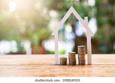 Structure house set with money coins saving for concept investment mortgage finance and home loan property - Shutterstock ID 1908249355
