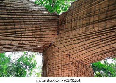 Structure made of long bamboo stems interwoven with fibers covering a concession stand on the hiking up way to the 50-60 ms.high Tat Kuang Si-Deer Dig falls 29 kms.-18 miles SW.of Luang Prabang-Laos.