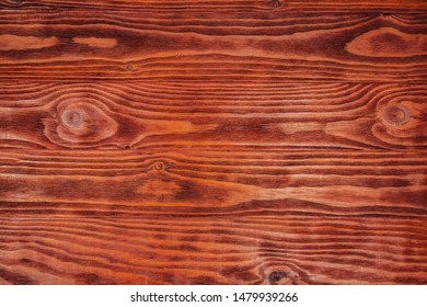 The Structure Of The Mahogany Surface As A Background Image. The Creative Concept Of Ecological Nature. Background Mahogany Pattern