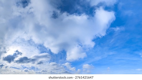 Structure of some cloud on the blue sky. White relaxed cottony form. Background serene sky. Fiber contours after rain. Lonely substance water.
