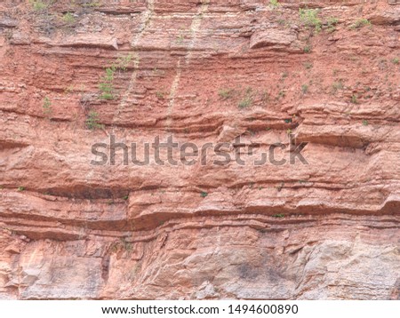 Structure of the surface of lime mine wall.  Underground multicolor fragments of wall in potassium and sodium salts