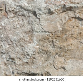 Structure of surface of the stone, used as background. Stone texture. Natural rocks