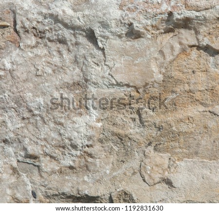 Structure of surface of the stone, used as background. Stone texture. Natural rocks