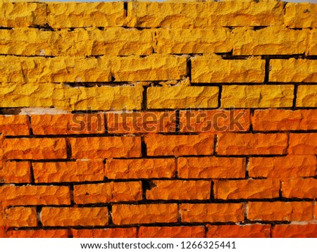 Structure of wall brick with yellow and orange color