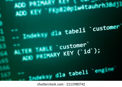 Structured Sql Code On Monitor. SQL Code On A Dark Background Development