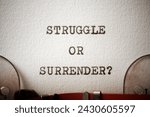 Struggle or surrender question text written with a typewriter.