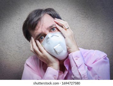 Struggling To Breathe. Anonymous Caucasian Man Wearing The Respiratory Protection Mask Against Air Pollution Exceed The Safety Limits. Healthcare, Environmental, Virus, Ecology Concept. 