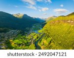 Stryn, Norway. Nature in fjords. Traveling through the Norwegian fjords. River in a mountain valley. Scandinavia. View of nature from the drone. Vacation and travel in summer Norway.